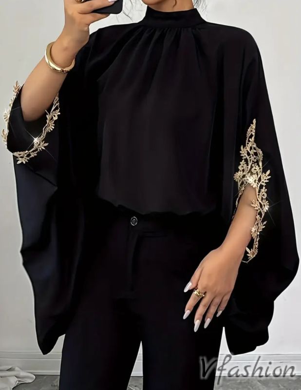 Широка блуза с бродерии