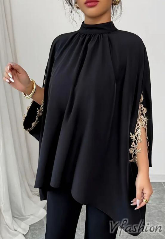 Широка блуза с бродерии